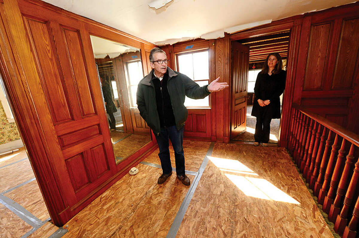 President of the Friends of Ambler Farm, Neil Gluckin, and Ambler Farm administrative coordinator, Robin Clune, give a tour of the Raymond-Ambler Farmhouse to show some of proposed renovations planned for the historic building.