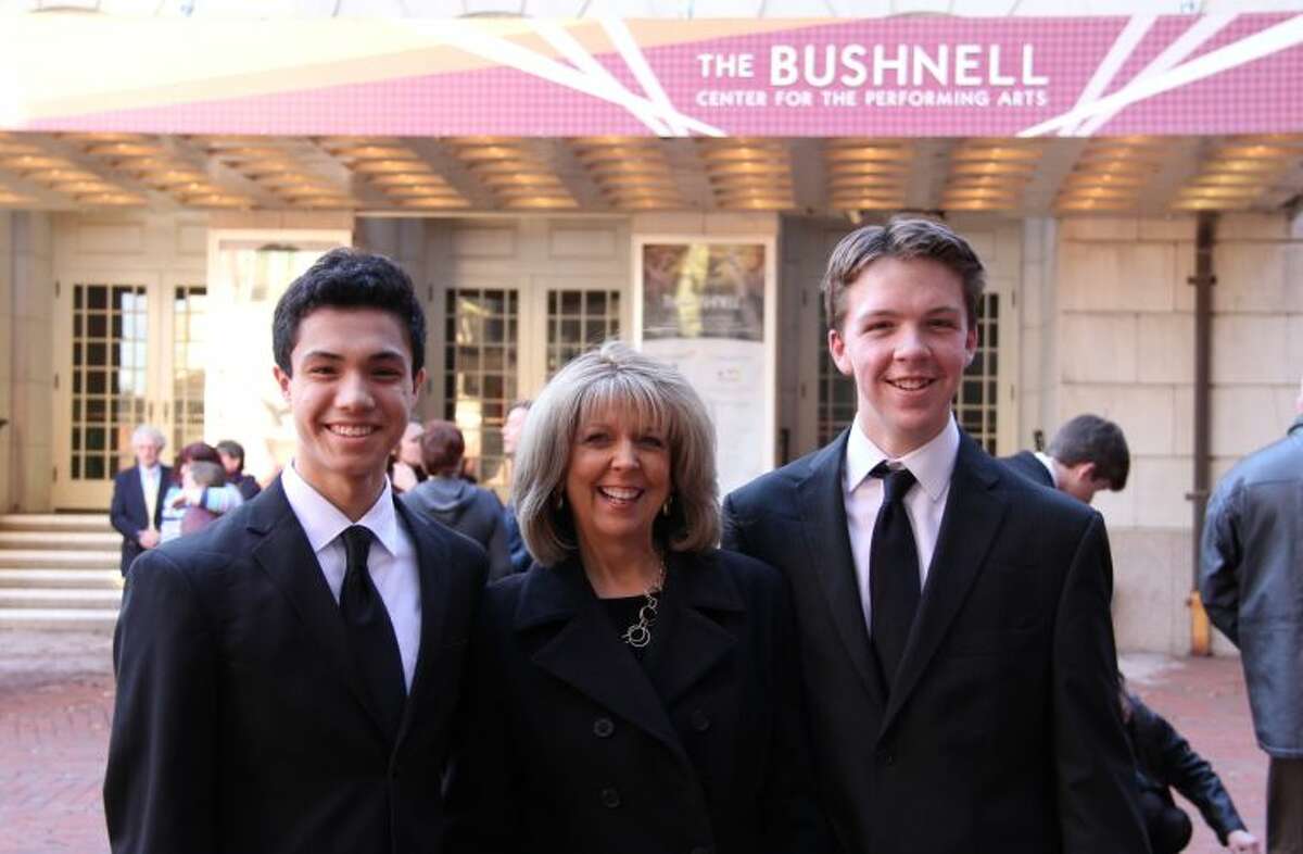 Chase Smith and Griffin King at the Bushnell Theatre with Betsey de Groff, their Choir Director at Wilton High School.
