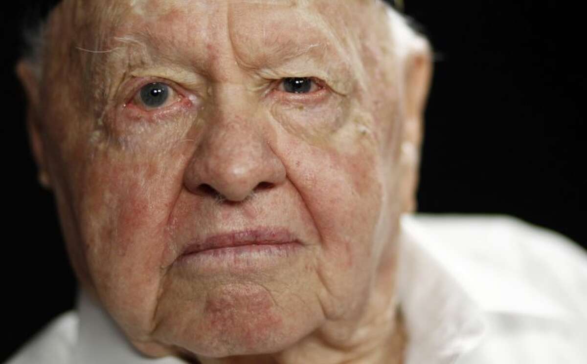 FILE - In this Thursday, May 19, 2011, file photo, actor Mickey Rooney poses during a portrait session in Los Angeles. Rooney, a Hollywood legend whose career spanned more than 80 years, has died. He was 93. Los Angeles Police Commander Andrew Smith said that Rooney was with his family when he died Sunday, April 6, 2014, at his North Hollywood home. (AP Photo/Matt Sayles, File)