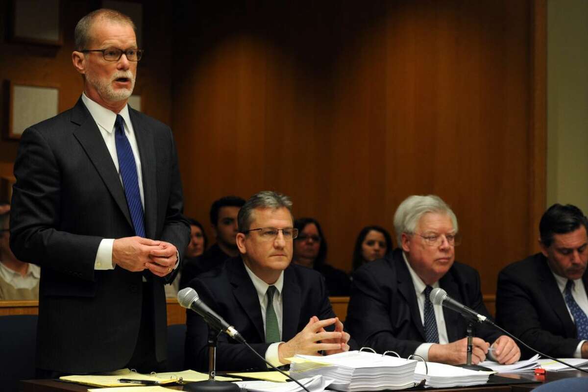 James Voghts, standing left, defense attorney for Remington Arms speaks in Superior Court in Bridgeport, Conn. Feb. 22, 2016, where final arguments were heard in a law suit brought by families of some of the Sandy Hook Elementary School shooting victims against the gun manufacturer. (Ned Gerard / Hearst Connecticut Media)