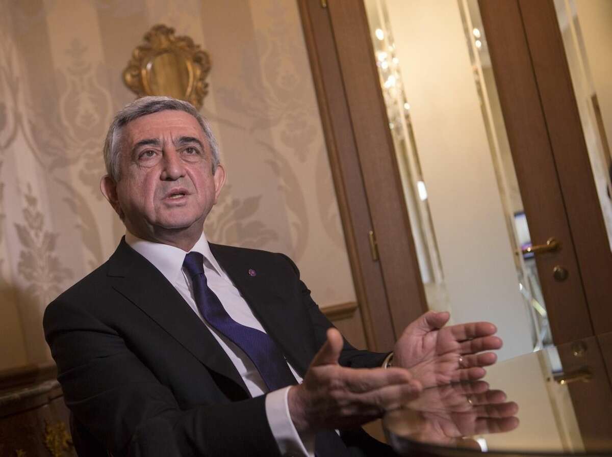 Armenian President Serzh Sargsyan speaks during an interview with The Associated Press in Rome, Sunday, April 12, 2015. Pope Francis sparked a diplomatic incident with Turkey on Sunday by calling the slaughter of Armenians by Ottoman Turks “the first genocide of the 20th century" and urging the international community to recognize it as such. Turkey, which denies a genocide took place, immediately summoned the Vatican ambassador to express its displeasure, a Foreign Ministry spokesman said in Ankara, speaking on customary condition of anonymity. (AP Photo/Riccardo De Luca)
