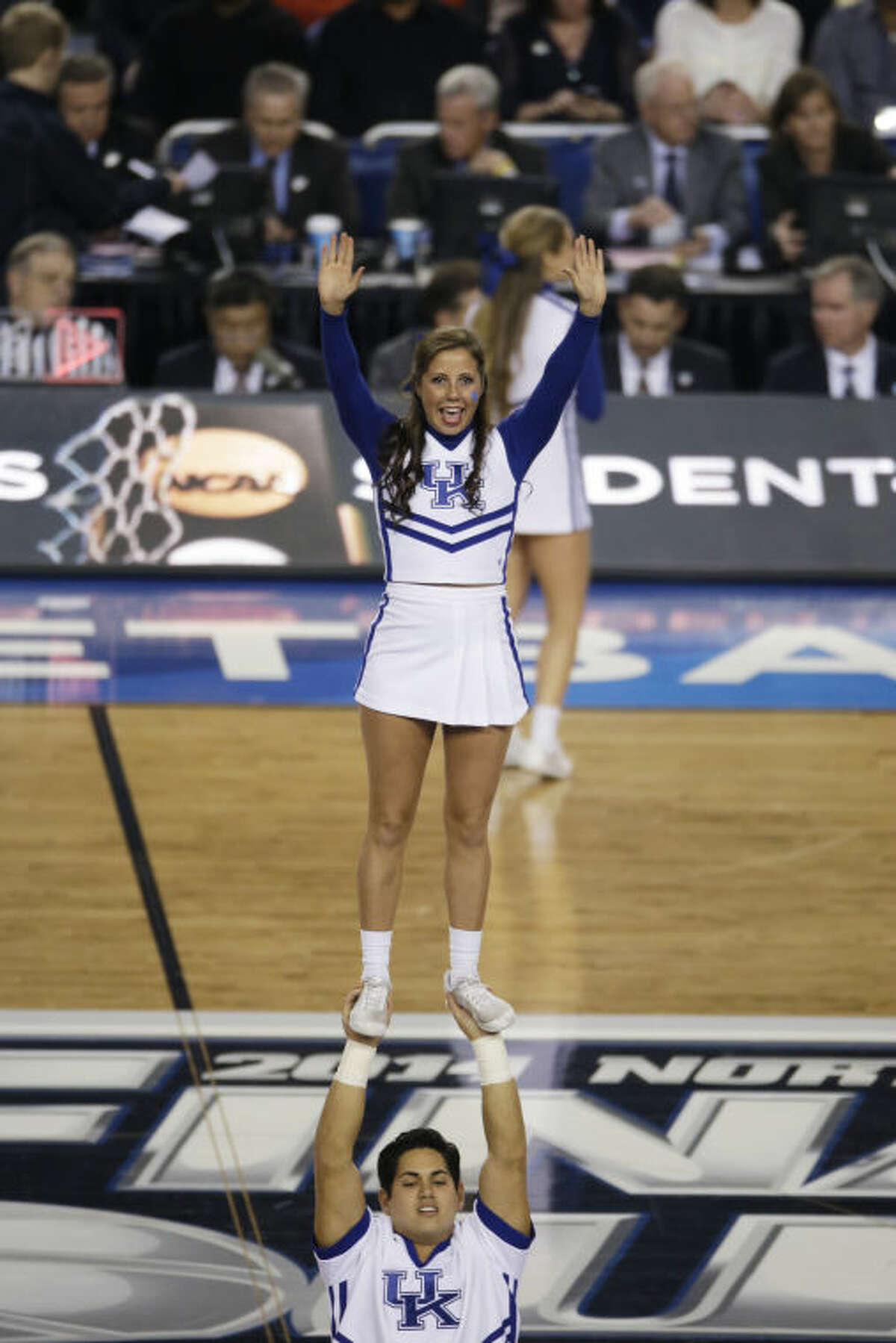Kentucky cheerleaders perform during the first half of the NCAA Final Four tournament college basketball championship game against Connecticut Monday, April 7, 2014, in Arlington, Texas. (AP Photo/Tony Gutierrez)