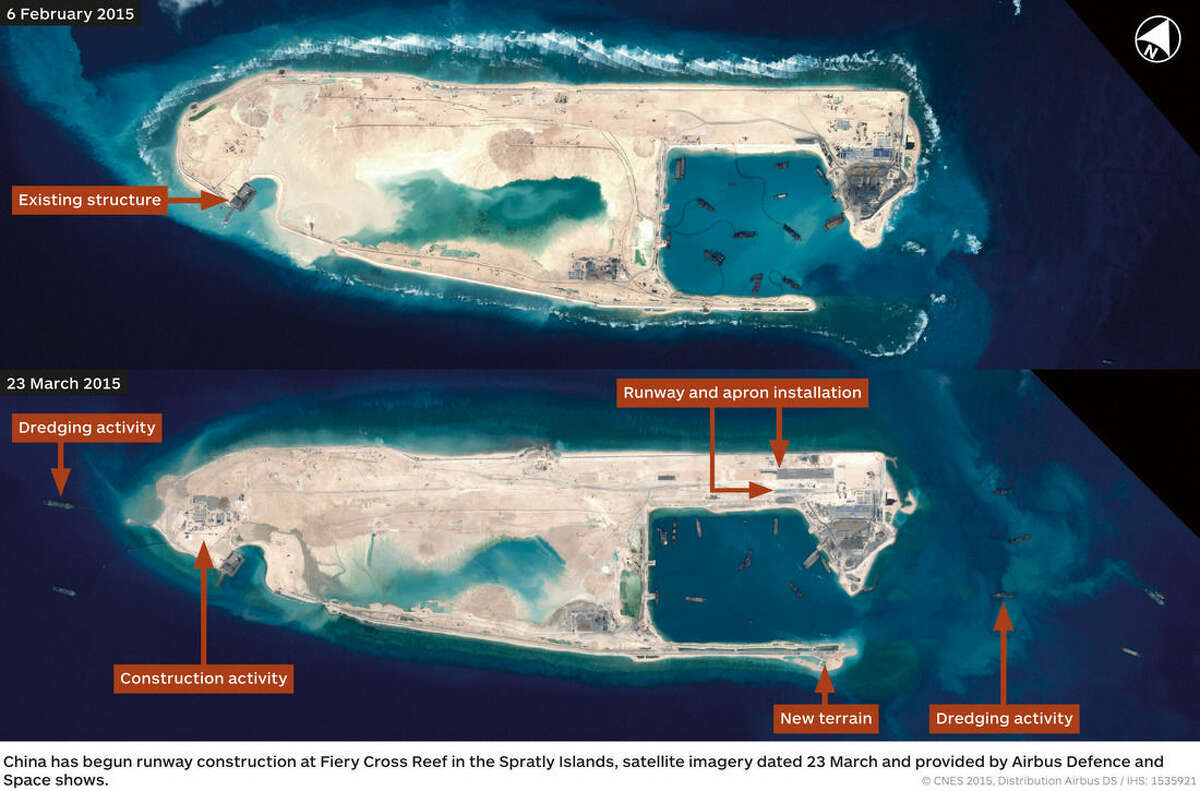 This combination photo of satellite images taken on Feb. 6, 2015, top, and March 23, 2015, bottom, by Airbus Defence and Space, and distributed by IHS Jane's Defence Weekly, shows what IHS Jane's describes as an airstrip on Fiery Cross Reef in a disputed section of the South China Sea. The U.S has warned that China's development on the artificially created island could raise tensions in the area. (CNES, Airbus Defence and Space/IHS Jane's Defence Weekly via AP)