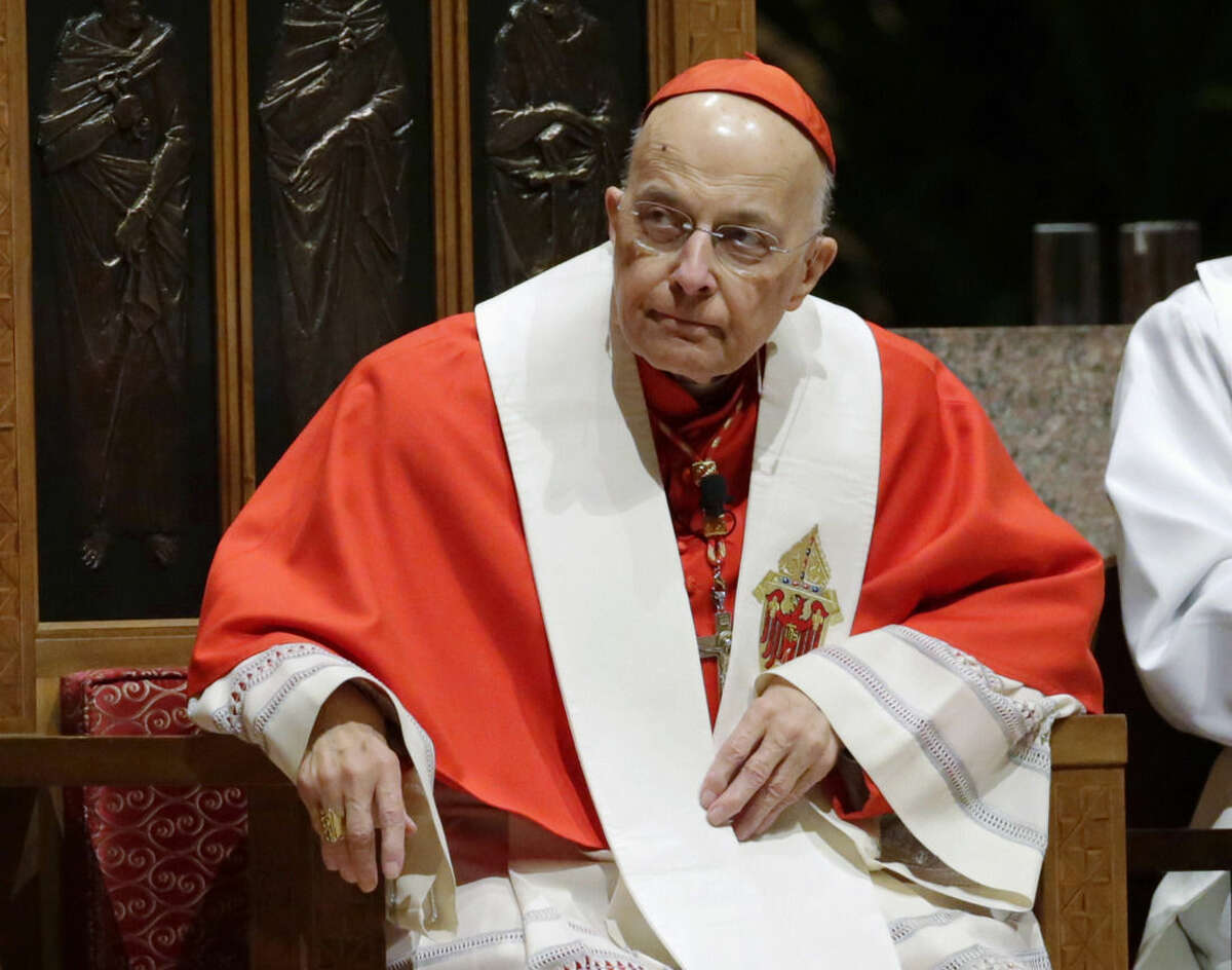 FILE - In this Nov. 17, 2014 file photo, retiring Cardinal Francis George listens at Holy Name Cathedral in Chicago during Bishop Blase Cupich's Rite of Reception service. The Chicago Archidiocese announced in Chicago, Friday, April 17, 2015, that George died after a long bout with cancer. He was 78. (AP Photo/Charles Rex Arbogast) The Archdiocese of Chicago said Tuesday, March 3, 2015, that George was admitted to the hospital Sunday, March 1, for evaluation after he stopped treatment for kidney cancer more than a month ago. Archdiocese officials say he'll stay there several days while tests are done. (AP Photo/Charles Rex Arbogast, File)