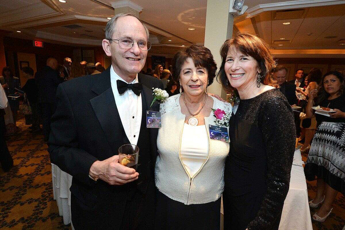 Hour Photo/Alex von Kleydorff Chairman of the Board Jerry Sprole, with Carol Salvato and Executive Director Valerie Williams help to raise money for Keystone House at the Mystery Gala