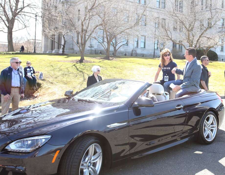 Uconn Parade Goers Catch Husky Fever In A Beemer The Hour