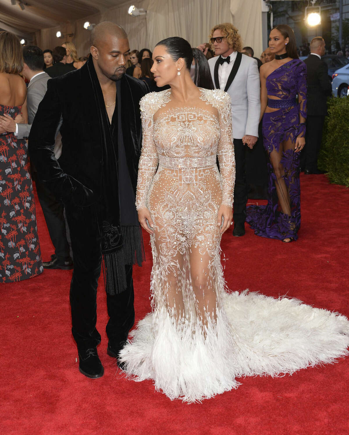 Kanye West, left, and Kim Kardashian arrive at The Metropolitan Museum of Art's Costume Institute benefit gala celebrating "China: Through the Looking Glass" on Monday, May 4, 2015, in New York. (Photo by Evan Agostini/Invision/AP)
