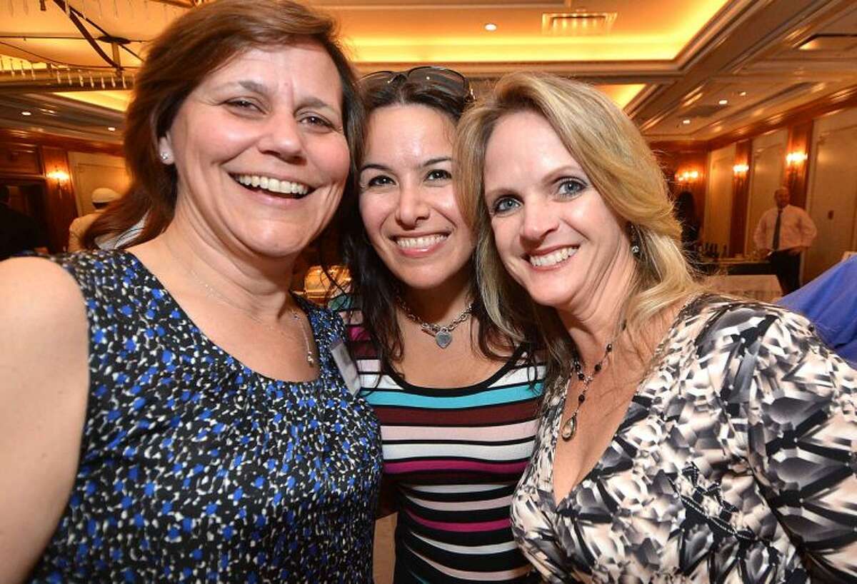 Hour Photo/Alex von Kleydorff Susan Zecca Anita Oehley and Shelly Welch share a laugh at the Silent Auction and Wine Tasting to benefit the PAL, Police Athletic League program at the Norwalk Police Department