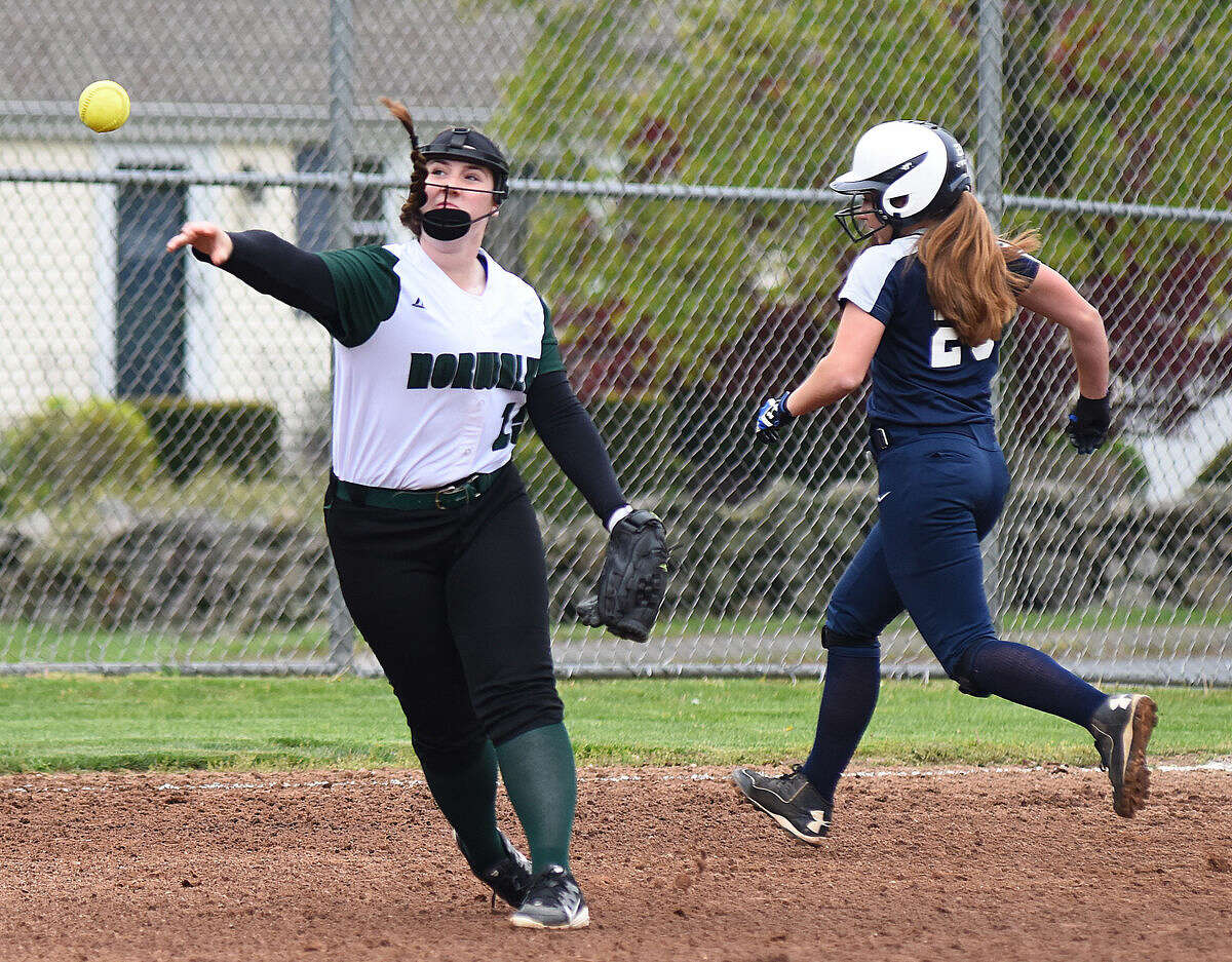Action from Monday's FCIAC Softball game between Staples and Norwalk. Staples won the game, 9-8.