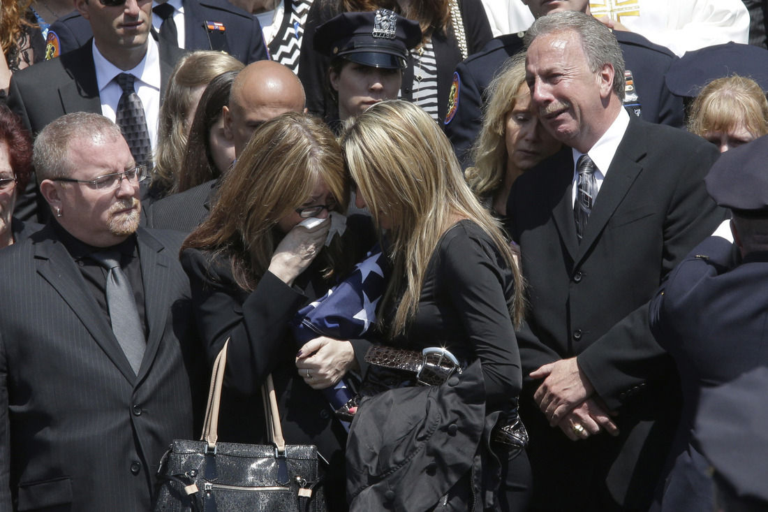 At New York officer's funeral, police reflect on tough time