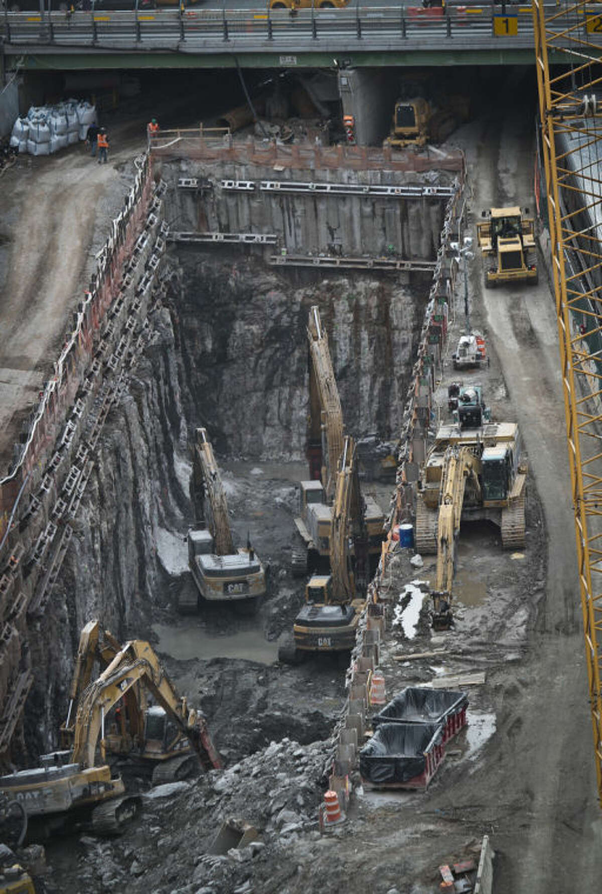 This photo taken on Thursday April 17, 2014, shows ongoing construction of a rail tunnel at the Hudson Yards redevelopment site on Manhattan's west side in New York. Amtrak is constructing an 800-foot-long concrete box inside the project to preserve space for a tunnel from Newark to New York City that would allow it to double rail capacity across the Hudson River. (AP Photo/Bebeto Matthews)