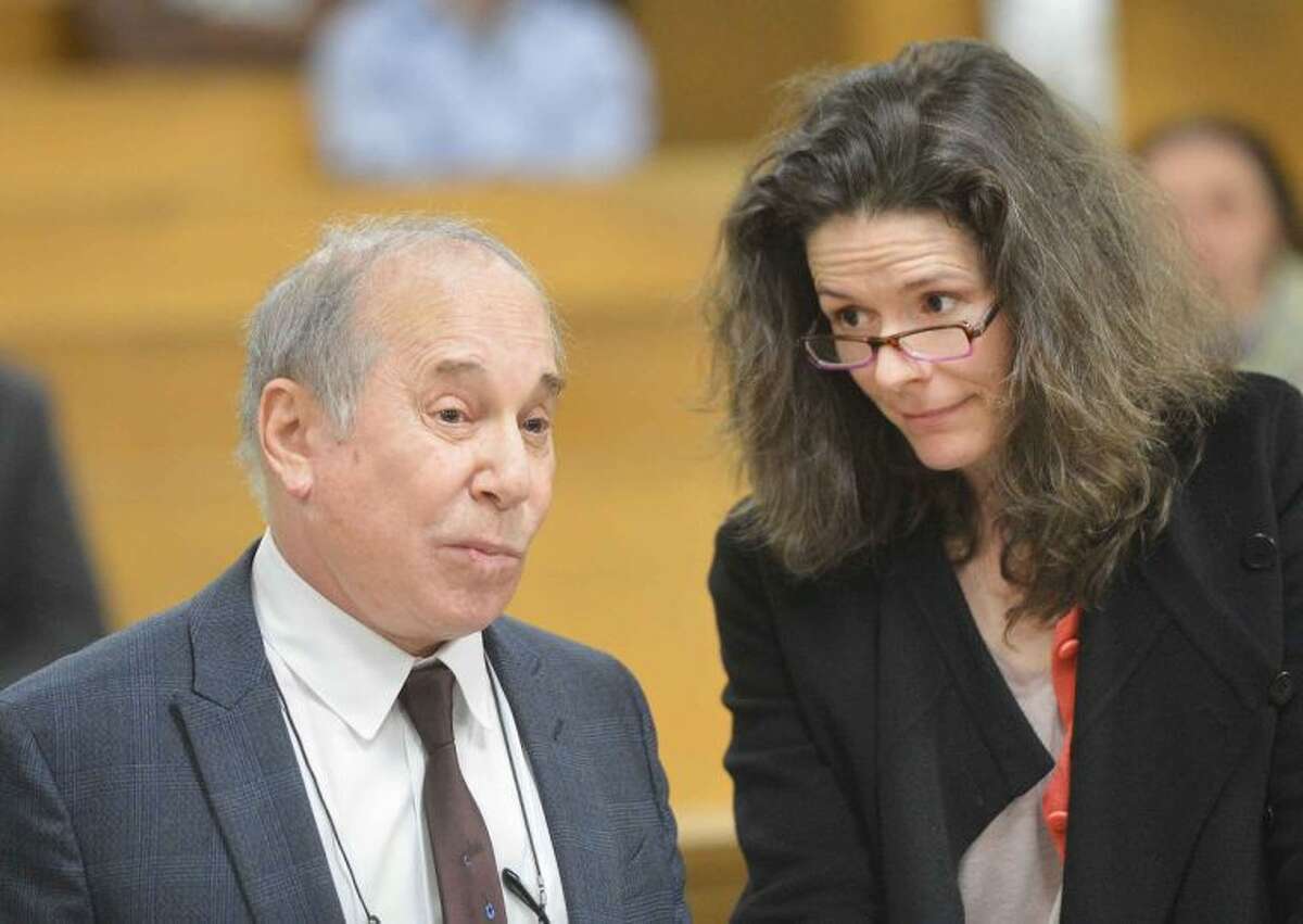 Hour Photo/Alex von Kleydorff.Paul Simon and Edie Brickell in Norwalk Superior Court on Monday April 28th. Famed singer Paul Simon and his musician wife Edie Brickell have been arrested on a misdemeanor domestic violence charge. New Canaan Police arrested Simon, 72, and Brickell, 47, on Saturday at approximately 8:20 p.m. Both Simon and Brickell were each charged with disorderly conduct for a disturbance at their New Canaan home.