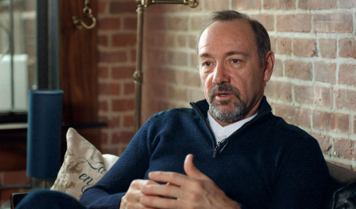 This image released by Donna Daniels Public Relations shows actor Kevin Spacey speaking from the documentary, "NOW: In the Wings on a World Stage," that captures Spacey and his troupe of 20 British and American actors during their 10-month international tour of "Richard II" from 2011-2012. (AP Photo/Donna Daniels Public Relations, Jeremy Whelehan)