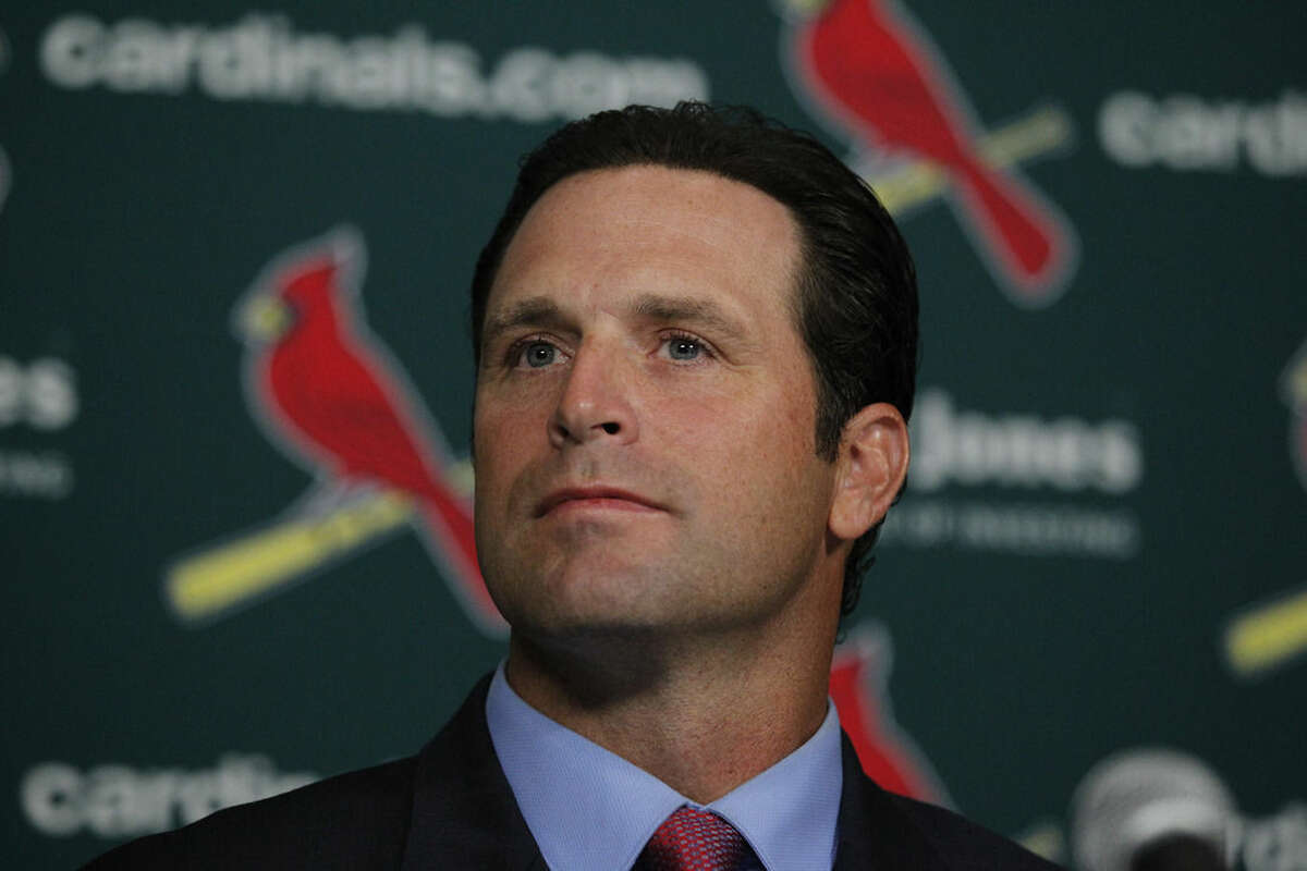 NY116 aFILE - In this Nov. 14, 2011, file photo, Mike Matheny is introduced as the St. Louis Cardinals' new manager during a news conference in St. Louis. Craig Counsell’s penchant for preparation and organizational know-how made the baseball lifer the perfect fit to take over as Milwaukee’s manager for Brewers general manager Doug Melvin. Counsell joins men like Matheny and the White Sox’s Robin Ventura as former players who took similar paths back to the dugout. (AP Photo/Jeff Roberson, File)