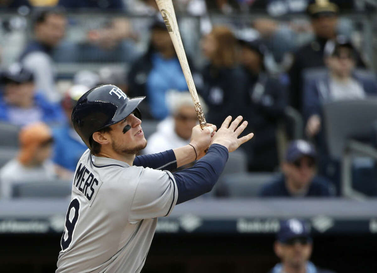 Tampa Bay Rays' Wil Myers hits a third-inning inside-the-park home run off New York Yankees starting pitcher CC Sabathia in a baseball game at Yankee Stadium in New York, Sunday, May 4, 2014. (AP Photo/Kathy Willens)