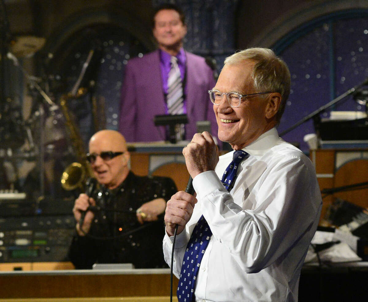 In this photo provided by CBS, David Letterman appears during a final taping of the “Late Show with David Letterman,” Wednesday May 20, 2015 in New York. After 33 years in late night television, 6,028 broadcasts, nearly 20,000 total guest appearances, 16 Emmy Awards and more than 4,600 career Top Ten Lists, David Letterman says goodbye to late night television audiences. (John Paul Filo/CBS via AP) MANDATORY CREDIT; NO ARCHIVE; NO SALES; NORTH AMERICAN USE ONLY