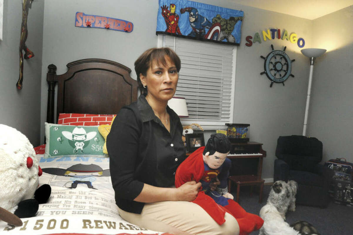 Hour photo / Matthew Vinci Maria "GiGi" Gonzalez in the room of her son Santiago, of whom she is currently fighting to regain custody in a legal battle that has spanned nearly two years.