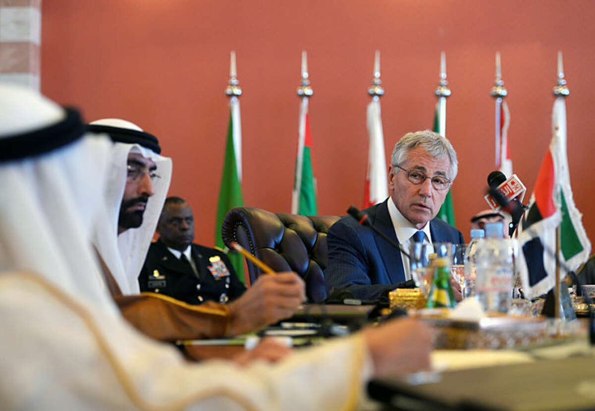 U.S. Defense Secretary Chuck Hagel, addresses his Gulf counterparts during a meeting in the Conference Palace, Jeddah, Saudi Arabia, Wednesday, May 14, 2014. In remarks opening a conference, Hagel said Wednesday that Washington is hopeful of progress this week in the Iran deal-drafting talks in Vienna. Hagel said that regardless of the outcome of the Iran negotiations, the U.S. will remain "postured and prepared" to ensure that Iran does not acquire a nuclear weapon. (AP Photo/Mandel Ngan, Pool)