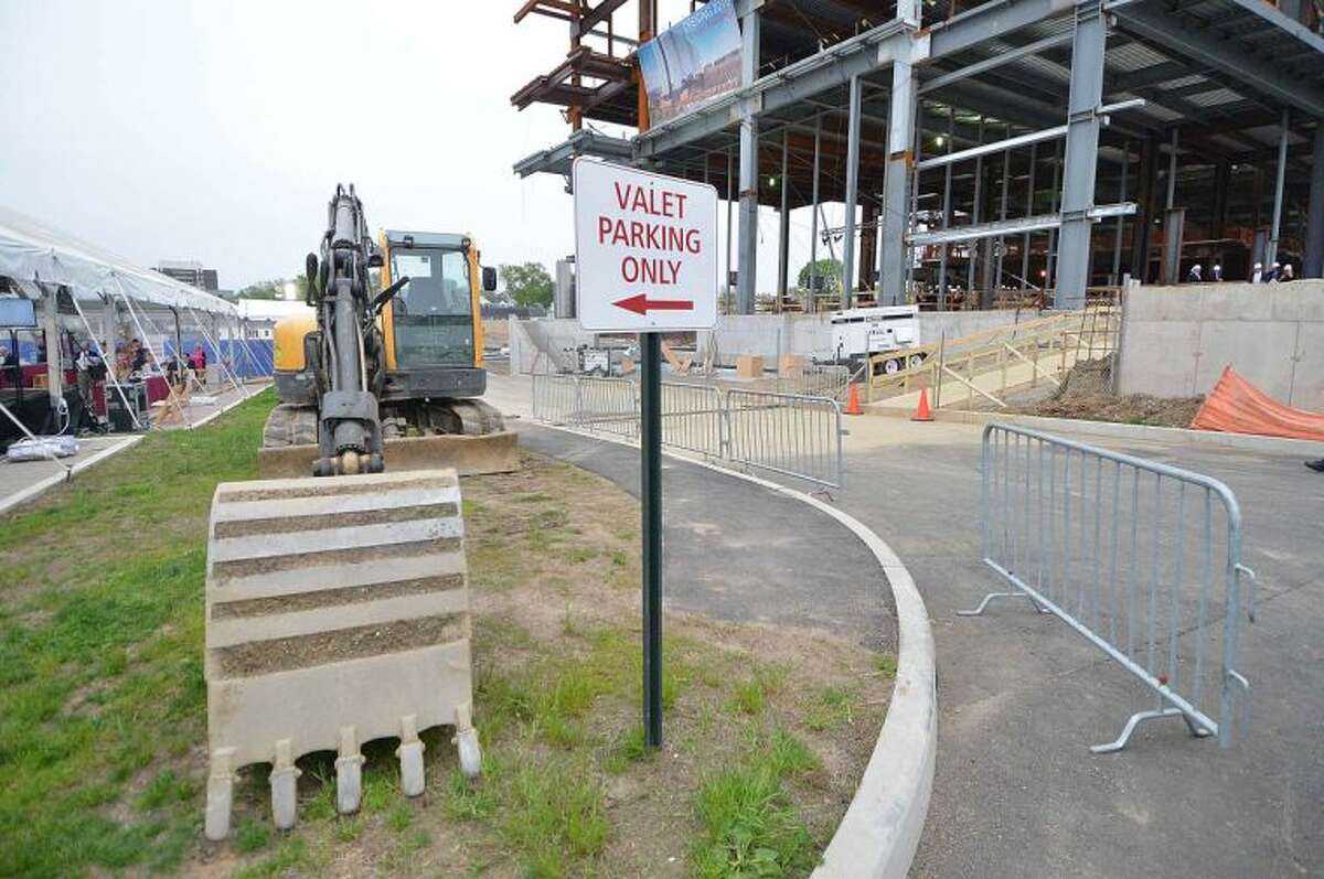 Hour Photo/Alex von Kleydorff Construction equipment parked not by valet as the sign would suggest at the Topping Off Ceremony for Stamford Hospitals new facility