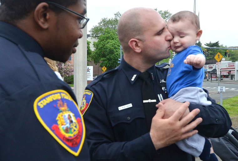 Stamford police officer retires after 26 years, passes torch to his son