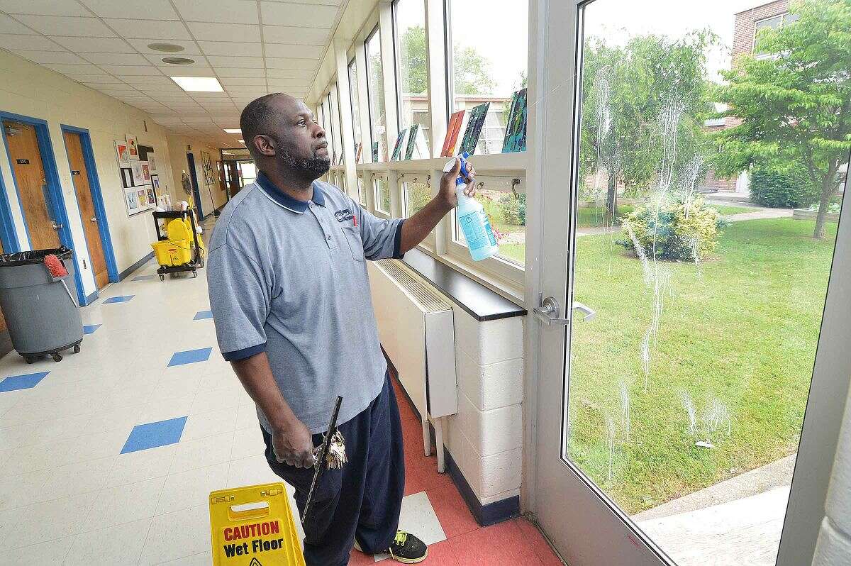 Custodians cite grievances with school district as result of outsourcing