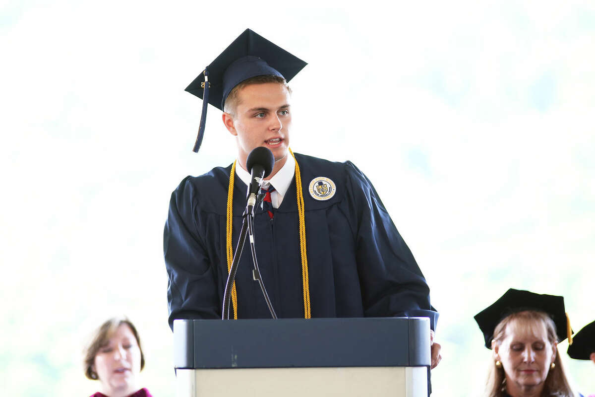 Jackson Marvin, Co-President of Class of 2015, gives the Welcome address during Weston High School's annual commencement ceremony Friday evening. Hour Photo / Danielle Calloway