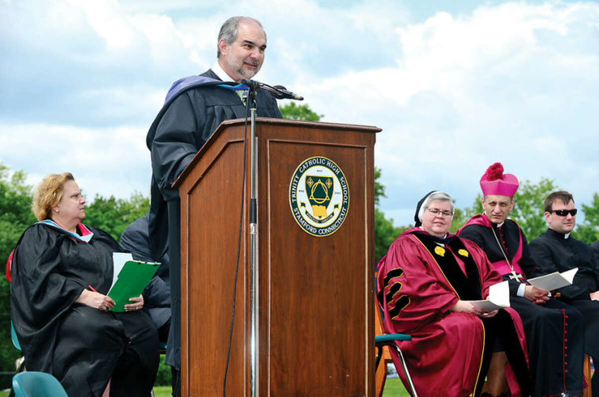 Hour photo / Erik Trautmann Tony Pavia gives his last graduation address as principal during the commencement excercises of the Trinity Catholic High School class of 2014.