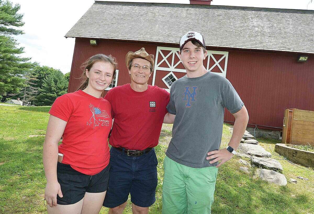 Ambler farm Program Director Kevin Meehan with the 2015 Raymond-Ambler Award-winners Kate Meehan and Sam Schmitt.
