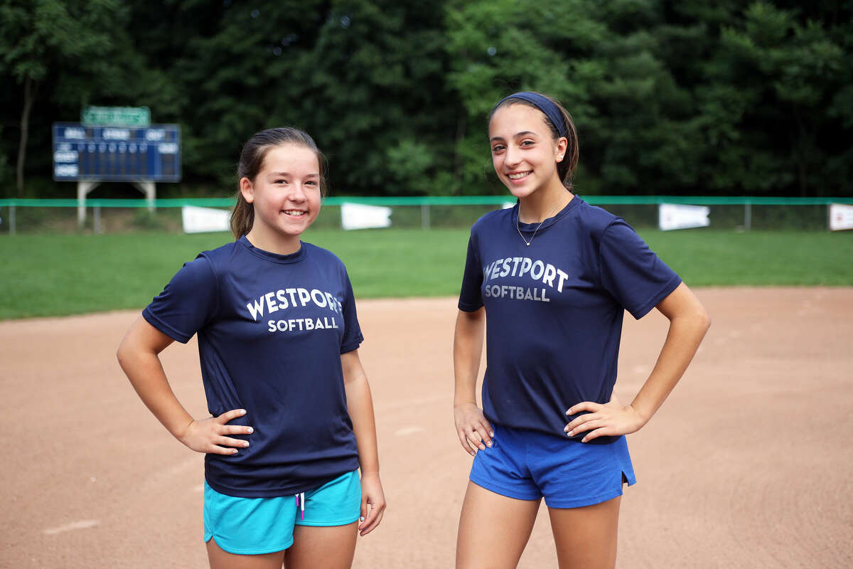 Westport Little League softball catcher Maisie Dembski, left, and pitcher Sophia Alfero form a dominant duo that has led Westport to a District Championship. Up next for Westport is the divisional tournament. (Hour photo/Danielle Calloway)