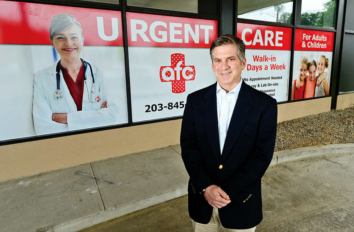 Hour photo / Erik Trautmann Owner Ken Goldberg prepares to open his new Urgent Care facility on Main Ave in Norwalk on July 23rd.