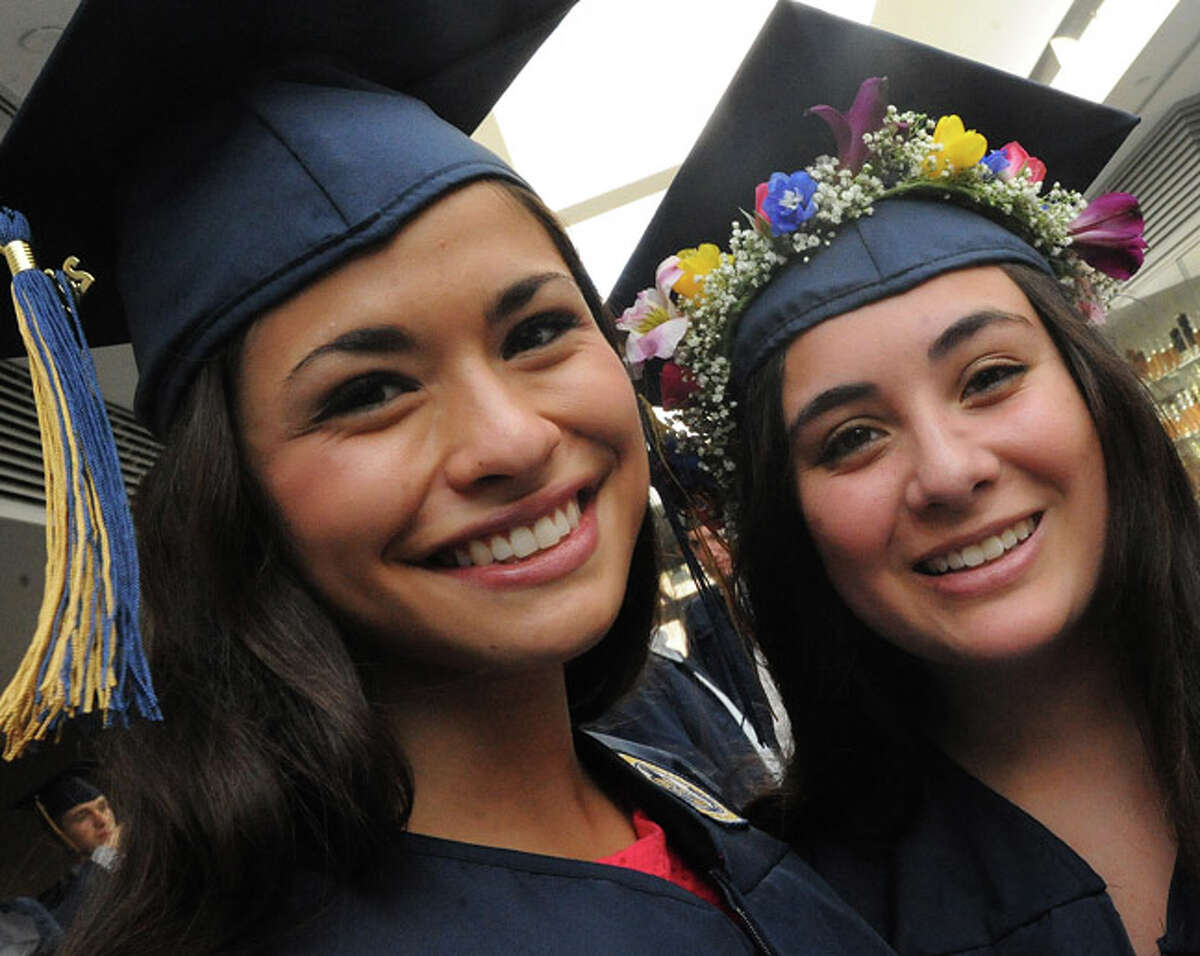 Mia Dimeglio and Gabby Gonzalez at the Weston High School graduation ceremony Tuesday night. Hour photo/Matthew Vinci