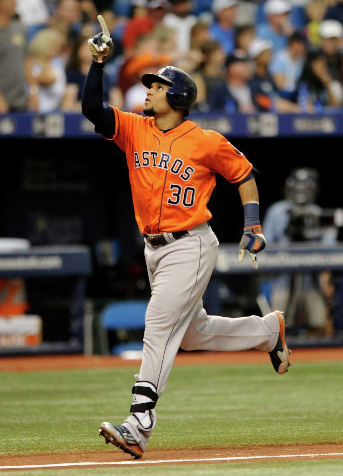 Houston Astros' Carlos Gomez (30) heads for home after hitting a solo home run off Tampa Bay Rays starter Chris Archer during the seventh inning of a baseball game, Saturday, June 11, 2016, in St. Petersburg, Fla. (AP Photo/Steve Nesius)