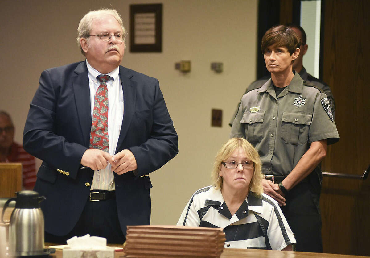 Joyce Mitchell as her attorney Stephen Johnston looks on during a court appearance, Tuesday July 28, 2015 in Plattsburgh, N.Y. Mitchell, an instructor in the tailor shop at the Clinton Correctional Facility, pleaded guilty to charges of aiding two inmates convicted of murder by smuggling hacksaw blades and other tools to the pair, who broke out and spent three weeks on the run in June. She faces a sentence of 2 1/3 to 7 years in prison under terms of a plea deal with prosecutors. (Rob Fountain/The Press-Republican via AP, Pool)