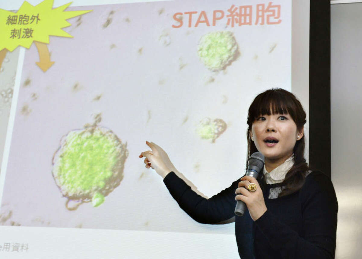 FILE - In this Jan. 28, 2014 file photo, researcher Haruko Obokata, the lead author of a widely heralded stem-cell research paper by the Japanese government-funded laboratory Riken Center for Development Biology, speaks about research results during a news conference in Kobe, western Japan. The scientists who reported in January that they'd found a startlingly simple way to make stem cells have withdrawn that claim, following accusations of falsified data. On Wednesday, July 2, 2014, the journal Nature released a statement from the scientists who acknowledged "extensive" errors and said they couldn't say "without a doubt" that their method works. (AP Photo/Kyodo News) JAPAN OUT, MANDATORY CREDIT: KYODO NEWS