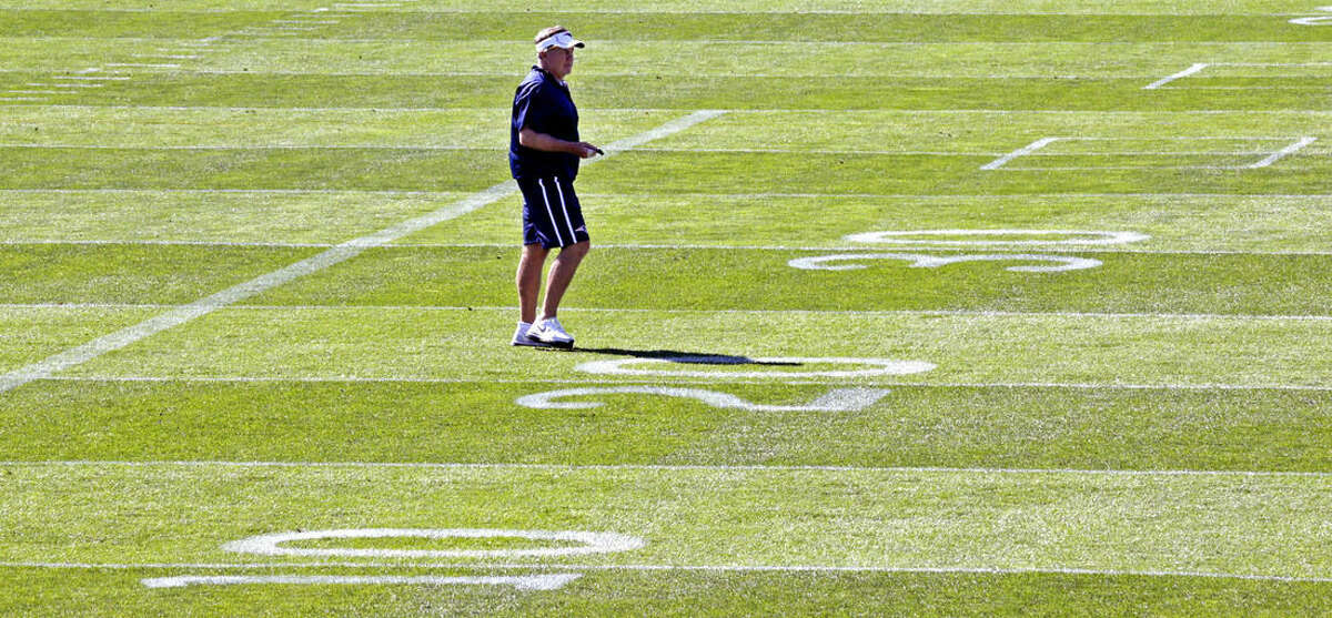 New England Patriots head coach Bill Belichick watches his players during an NFL football training camp in Foxborough, Mass., Friday, July 31, 2015. (AP Photo/Charles Krupa)
