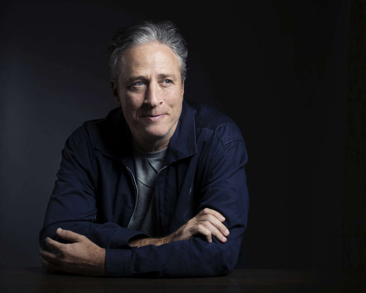 FILE - In this Nov. 7, 2014 file photo, Jon Stewart poses for a portrait in promotion of his film,"Rosewater," in New York. Stewart says goodbye on Thursday, Aug. 6, 2015, after 16 years on Comedy Central's "The Daily Show" that established him as America's foremost satirist of politicians and the media. (Photo by Victoria Will/Invision/AP, File)