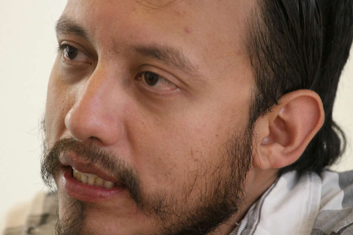 In this June 26, 2015 photo, Mexican photojournalist Ruben Espinosa speaks during an interview in Mexico City. Espinosa had recently gone into self-exile from the Gulf coast state of Veracruz, where he felt under threat, according to Proceso magazine. His family had lost contact with him on Friday and by Saturday the free speech advocacy group Article 19 had called on Mexican authorities to activate the protocols for locating a missing journalist. Espinosa was found slain, along with four other people early Saturday in an apartment in Mexico City, according to the magazine. (AP Photo/Luis Barron)