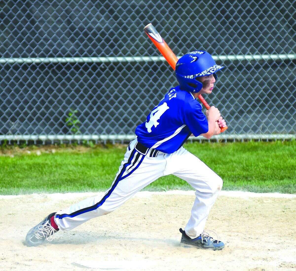 Norwalk's Chris Ely laces a two-run double with the bases loaded during Sunday's Norwalk 11-year-old Cal Ripken New England regional game vs. Swanzey, N.H.., at Keyes Field in Dover, N.H. Norwalk won 5-2 and Ely is 4-for-4 with seven RBIs with the bases loaded through two games.