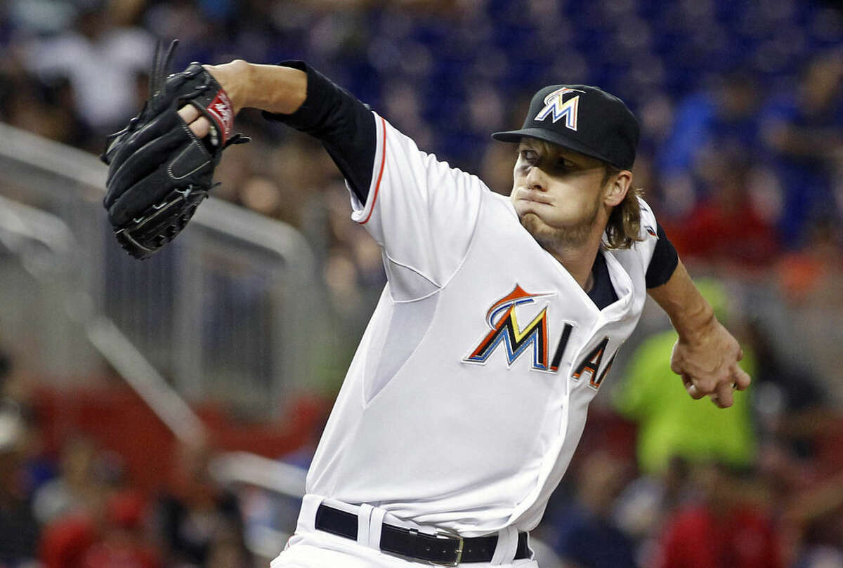 Miami Marlins relief pitcher Adam Conley throws against the New York Mets in the fifth inning during a baseball game in Miami, Tuesday Aug. 4, 2015. (AP Photo/Joe Skipper)
