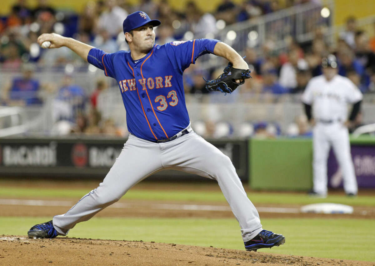 New York Mets starting pitcher Matt Harvey throws against the Miami Marlins during the first inning of a baseball game in Miami, Wednesday Aug. 5, 2015. (AP Photo/Joe Skipper)