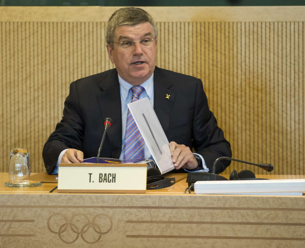 International Olympic Committee, IOC, President Thomas Bach of Germany, waits prior to the opening of the executive board meeting at the IOC headquarters in Lausanne, Switzerland, on Monday, July 7, 2014. (AP Photo/Keystone,Jean-Christophe Bott)