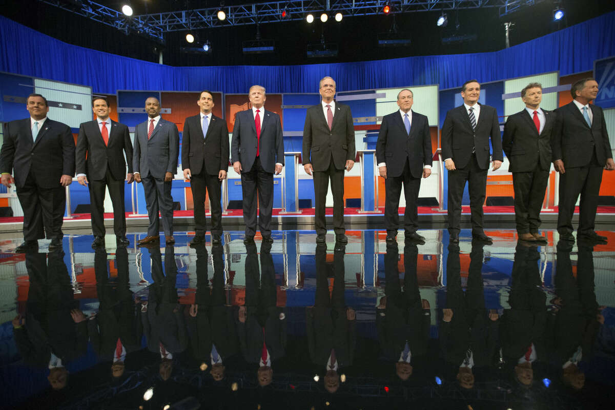 Republican presidential candidates from left, Chris Christie, Marco Rubio, Ben Carson, Scott Walker, Donald Trump, Jeb Bush, Mike Huckabee, Ted Cruz, Rand Paul, and John Kasich take the stage for the first Republican presidential debate at the Quicken Loans Arena, Thursday, Aug. 6, 2015, in Cleveland. (AP Photo/Andrew Harnik)
