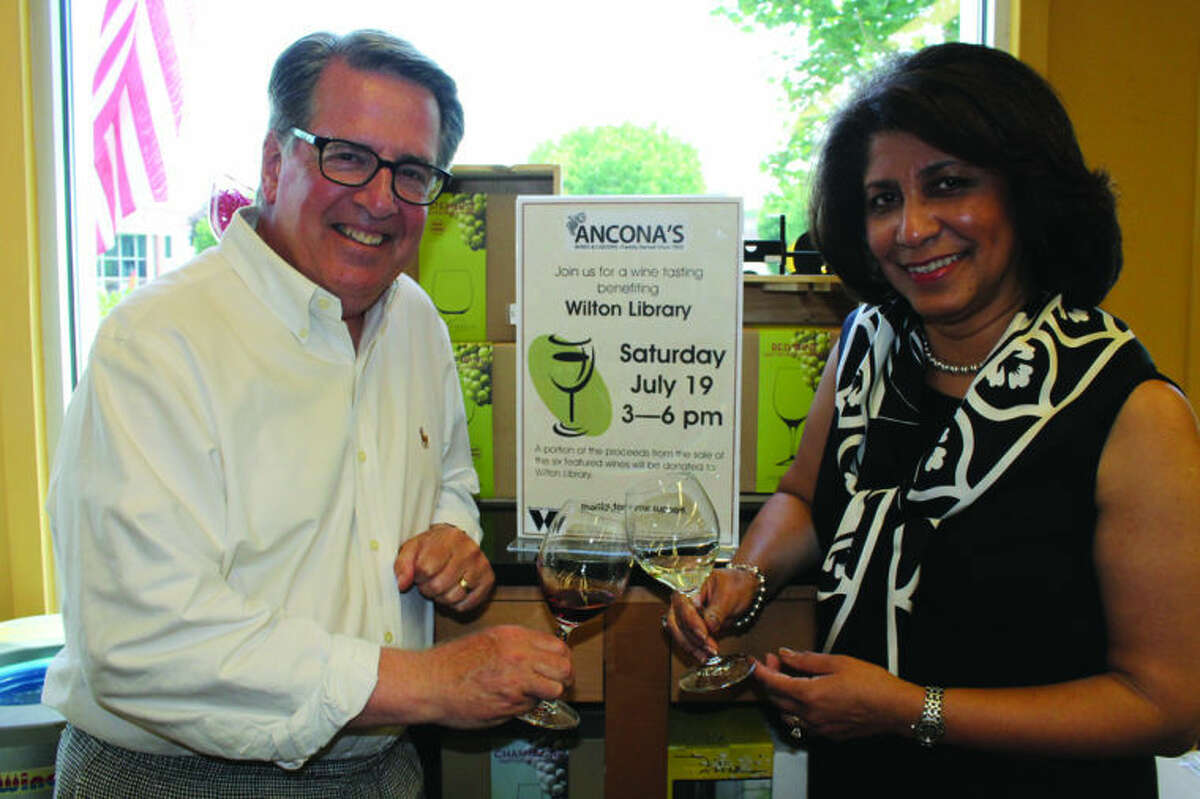 Michael Crystal will be hosting a wine tasting by Ancona’s Wines & Liquors. He is pictured with Elaine Tai-Lauria, executive director of Wilton Library, which will benefit from proceeds at the event. Acona’s wine tasting event will be on Saturday, July 19, from 3-6 p.m.