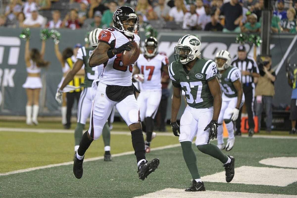 Atlanta Falcons' Leonard Hankerson (85) runs in front of New York Jets' Jaiquawn Jarrett (37) after scoring a touchdown on a pass from quarterback Matt Ryan during the first half of a preseason NFL football game Friday, Aug. 21, 2015, in East Rutherford, N.J. (AP Photo/Bill Kostroun)