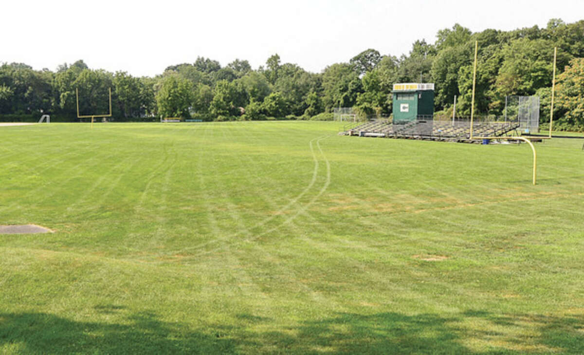 Photo by Erik Trautmann Trinity Catholic High School in Stamford was supposed to have a brand new multiple-purpose, artificial turf athletic field in place for this fall sports season but work has not started.