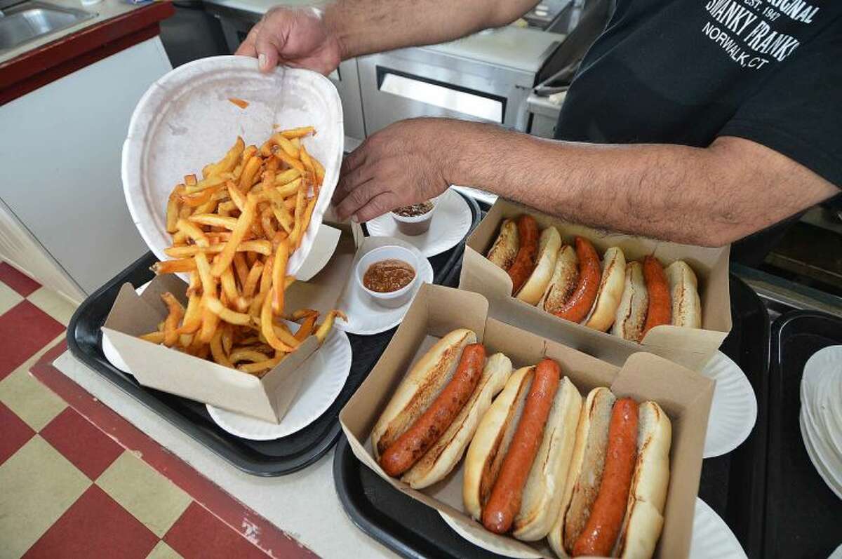 Hour Photo/Alex von Kleydorff Hot Dogs and Fries at Swanky Franks in Norwalk