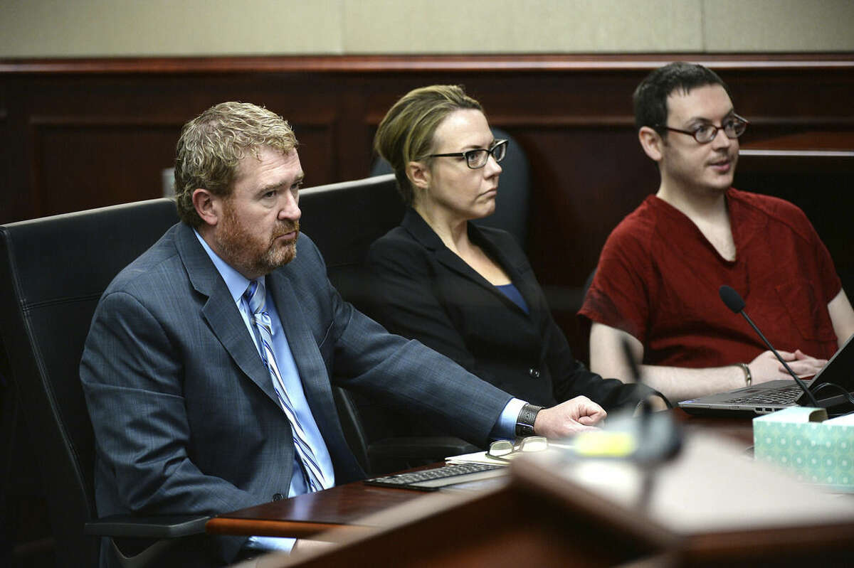 James Holmes, right, appears in court with defense attorneys Daniel King, left, and Katherine Spengler, for the sentencing phase in his trial, Monday, Aug. 24, 2015, at Arapahoe County District Court in Centennial, Colo. Victims and their families were given the opportunity to speak about the shooting and its effects on their lives. Holmes was convicted Aug. 7 of murdering 12 people when he opened fire on a crowded movie theater in 2012. (RJ Sangosti/The Denver Post via AP, Pool)