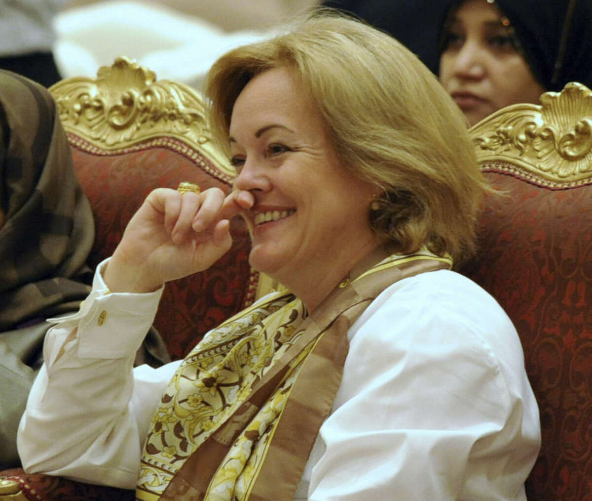 FILE - In this March 8, 2010 file photo, US Ambassador to Kuwait Deborah Jones is seen in Kuwait City. On Saturday, July 26, 2014,The United States shut down its embassy in Libya and evacuated its diplomats to neighboring Tunisia under U.S. military escort amid a significant deterioration in security in Tripoli as fighting intensified between rival militias, the State Department said. On Sunday, July 20, 2014, U.S. Ambassador to Libya Deborah Jones tweeted about ?“heavy shelling and other exchanges?” of fire in the vicinity of the embassy. (AP Photo/Gustavo Ferrari, File)