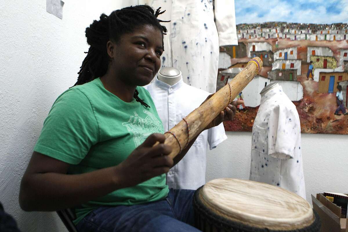 Ngaire Young uses a rain stick to add to the rehearsal for "Crack. Rumble. Fly: The Bayview Stories Project," on Thursday, June 9, 2016 in San Fransisco, California.