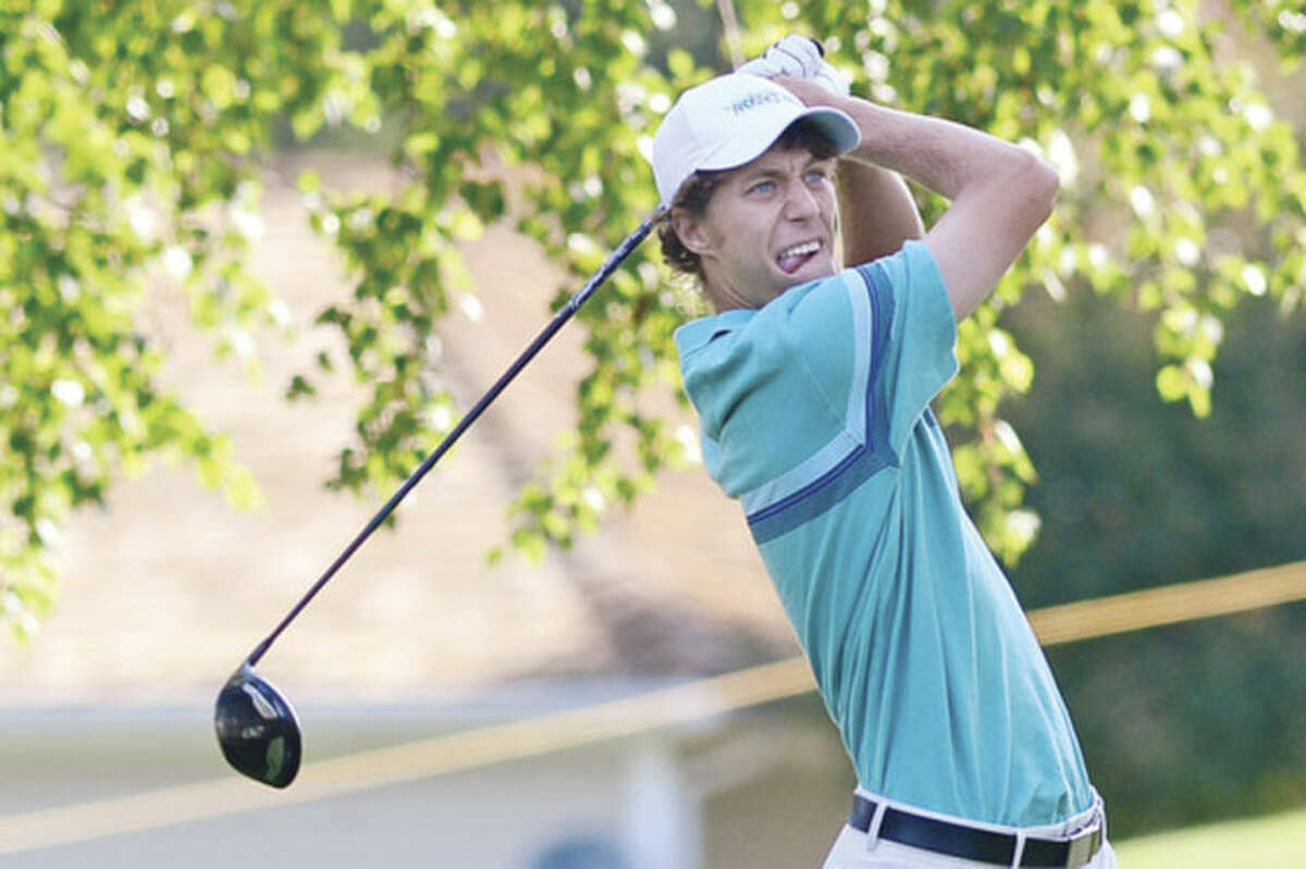Hour photo/Erik Trautmann Westporter Andrew Gai hits off the first tee during The Connecticut Open Golf Championships at Rollings Hills Country Club in Wilton on Tuesday. Gai shot 77-72 and failed to make the cut for todays' third and final round.